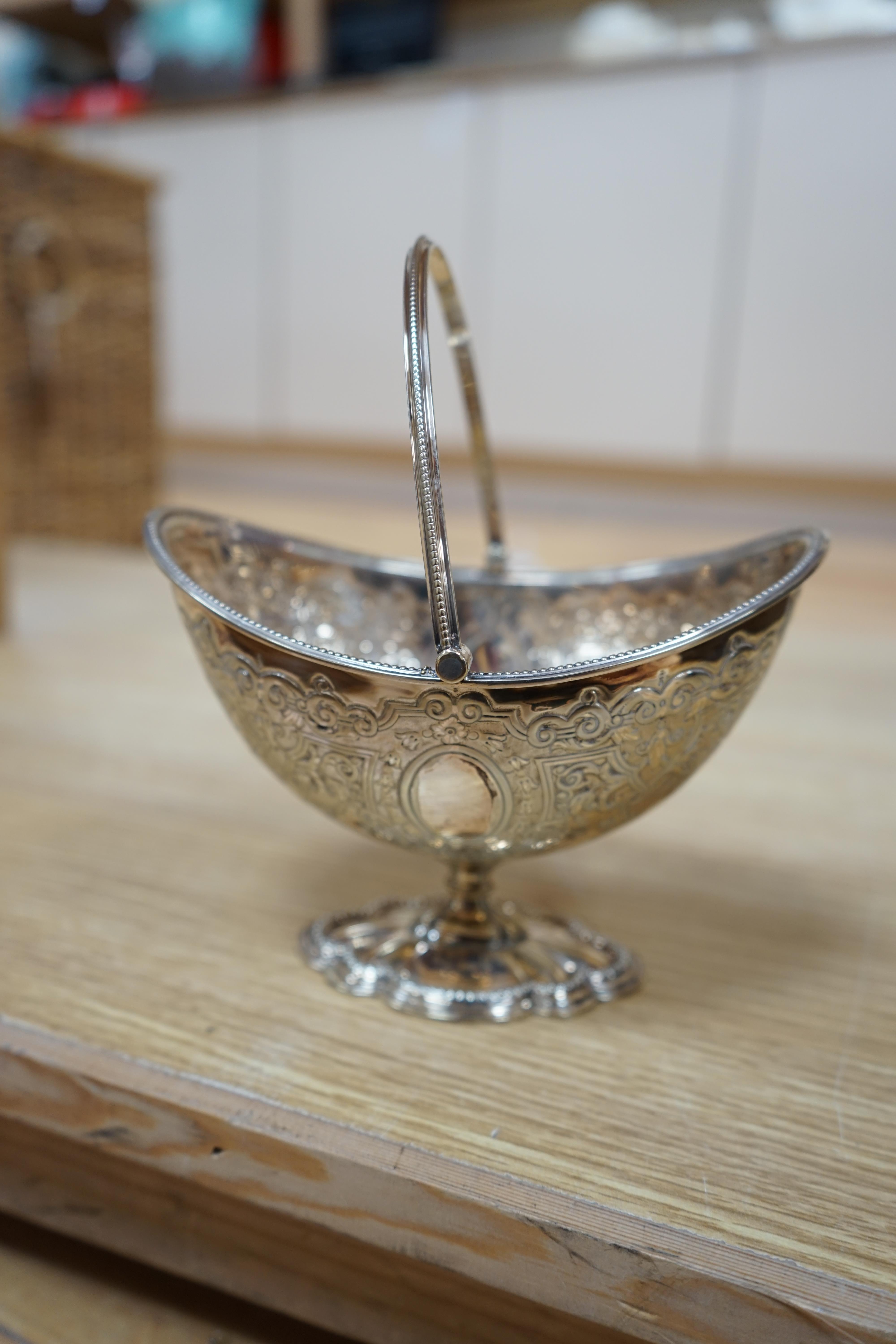 A large quantity silver plated cutlery including a part canteen of King's pattern cutlery and beaded pattern cutlery, a plated sugar basket, together with a mahogany, velvet lined box, 38cm wide. Condition - fair